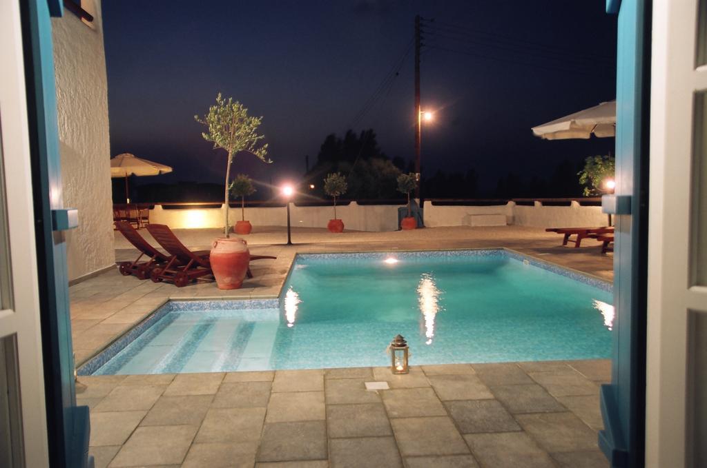 Votsalo Villa Pomos Habitación foto