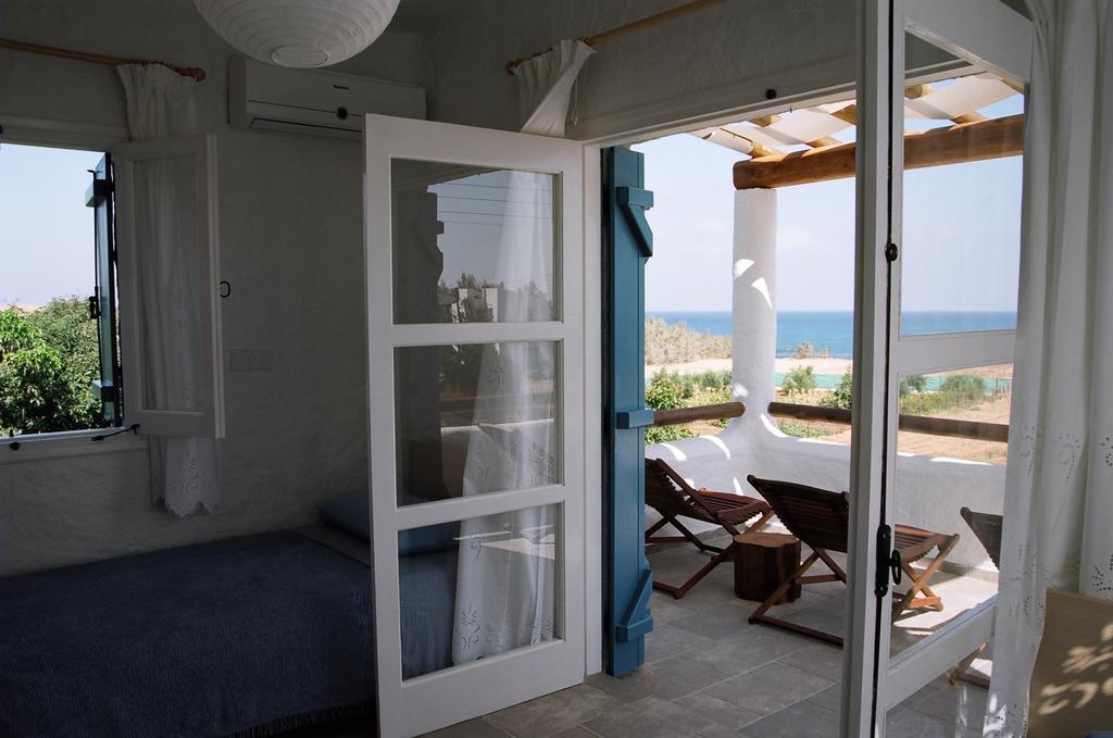 Votsalo Villa Pomos Habitación foto