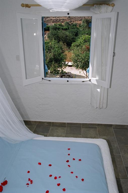 Votsalo Villa Pomos Habitación foto