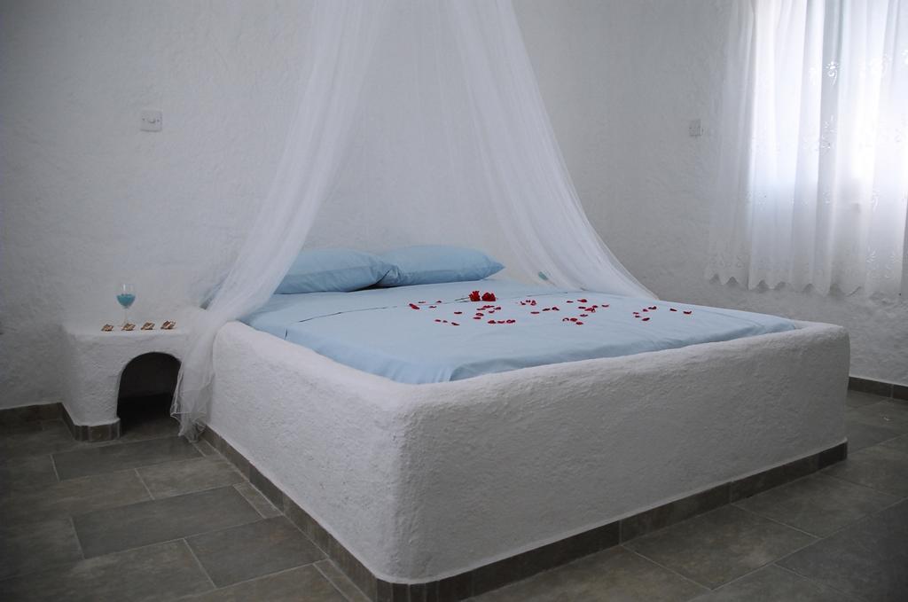 Votsalo Villa Pomos Habitación foto